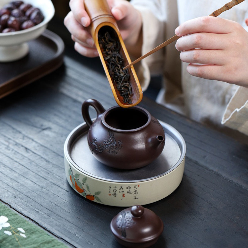 Yixing Purple Clay Plum Blossom Teapot