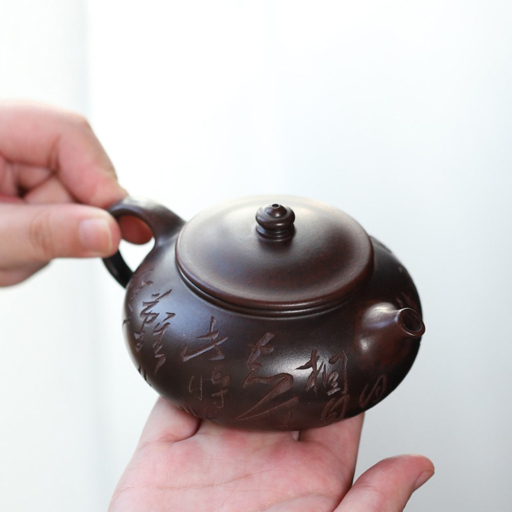 Yixing Purple Clay Calligraphy Carving Teapot