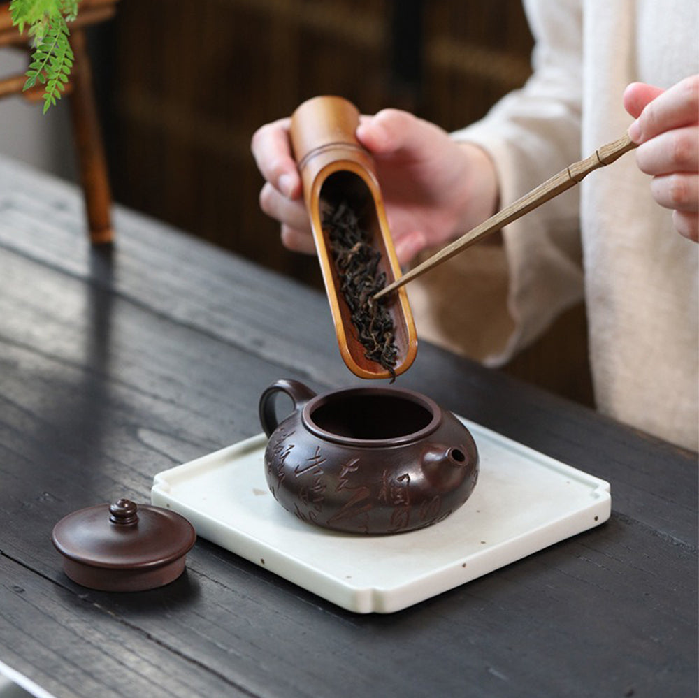 Yixing Purple Clay Calligraphy Carving Teapot
