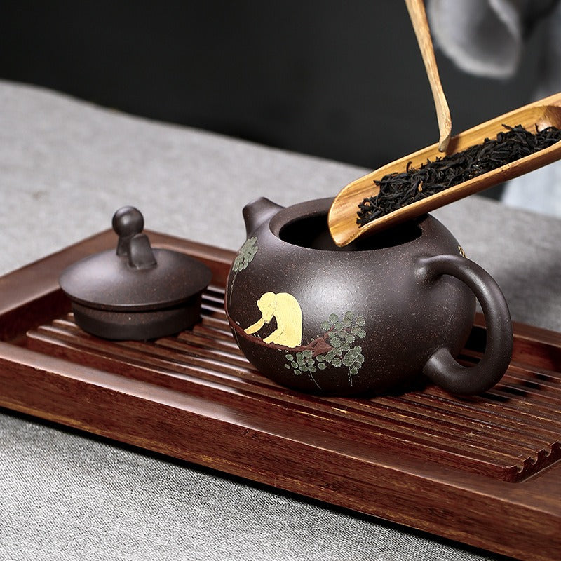 Yixing Black Golden Clay Monkey Pine Teapot