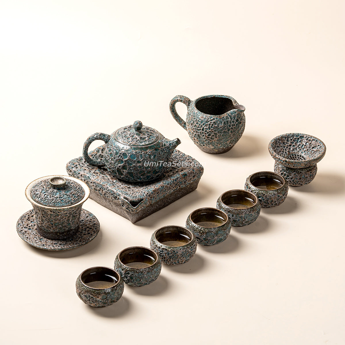 Vintage Bronze Coarse Pottery Wormhole Tea Set